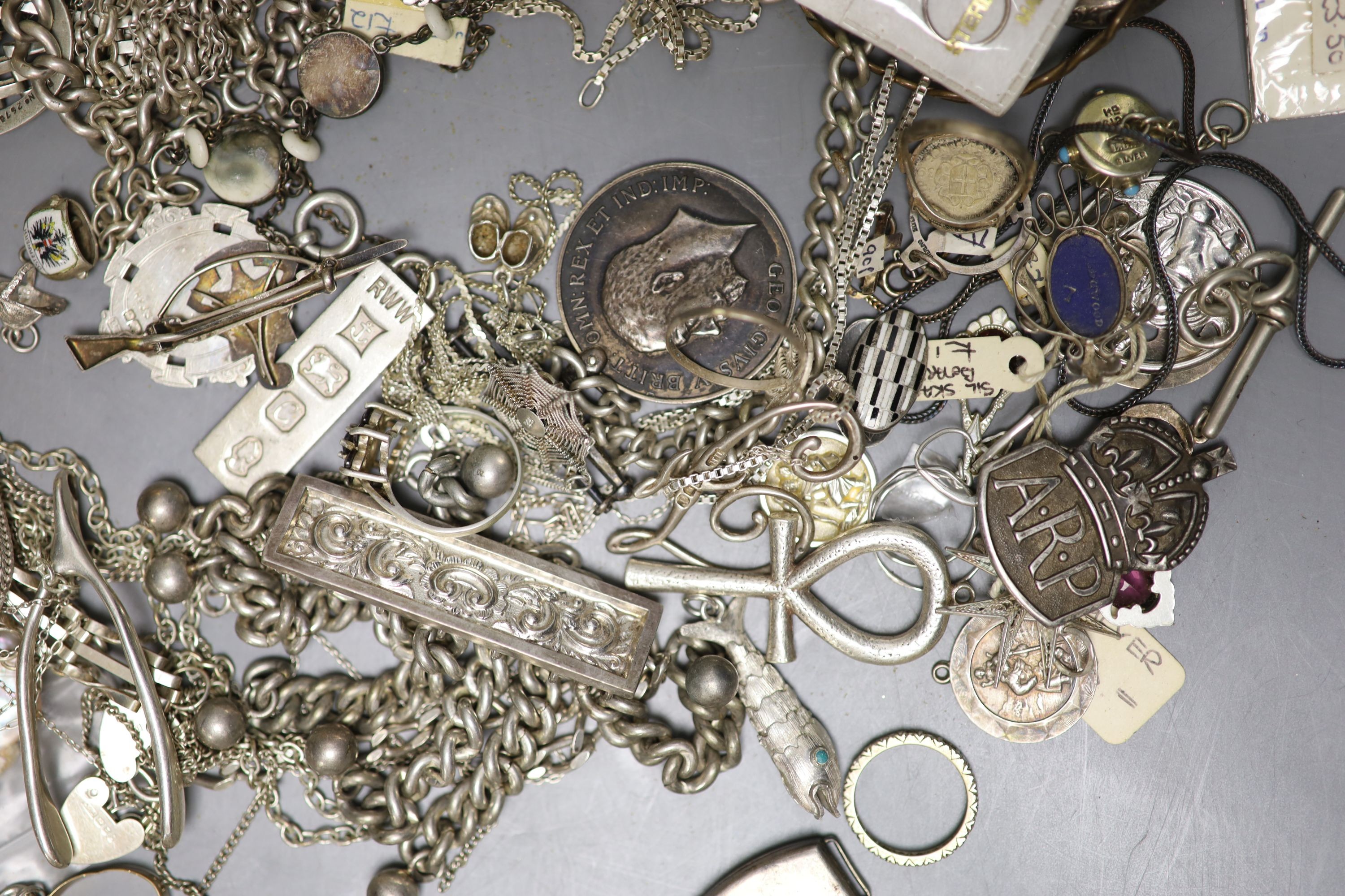 A quantity of assorted minor mainly silver or white metal jewellery including chains, charms, bracelet, pinchbeck cameo watches etc